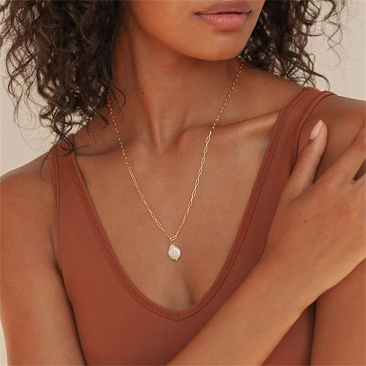 Luminous “classic pearl-style accent Pendant Necklace on Gold Paperclip  PVD Chain .